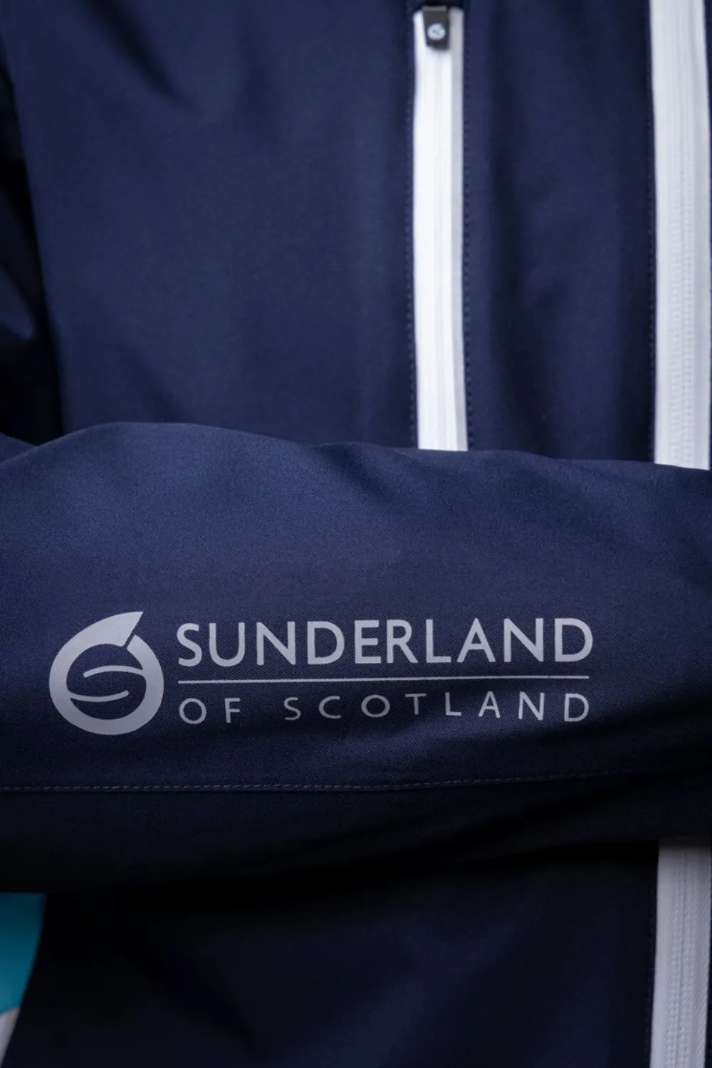 SUNDERLAND Valberg Zip Front Stretch Waterproof Golf Jacket - Mens - Navy / Aqua / White